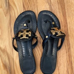 Tory Burch Black Leather Logo Thong Sandals with Gold Medallion
